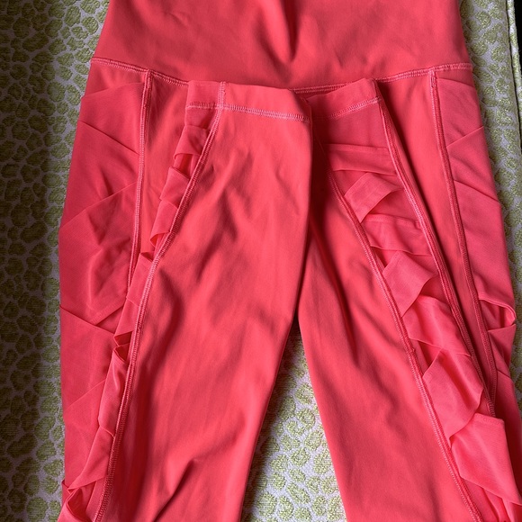 Lululemon Rise and Flow legging in Cape Red coral color with pockets, high rise! - Picture 9 of 9